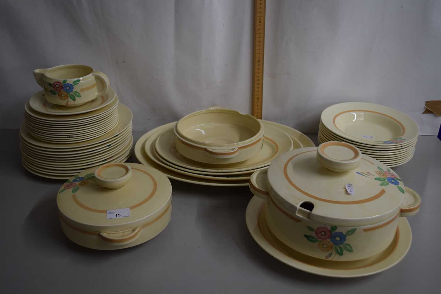 Quantity of Clarice Cliff Newport pottery dinner wares with floral decoration