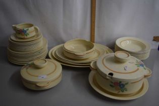 Quantity of Clarice Cliff Newport pottery dinner wares with floral decoration
