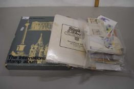 A Stanley Gibbons International stamp album containing a range of various world stamps together with