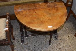 A Victorian walnut veneered Sutherland style drop leaf table