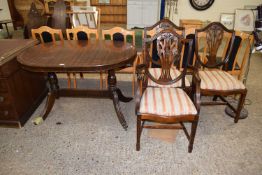 A twin pedestal dining table and three dining chairs (4)