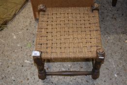 A sisal covered footstool