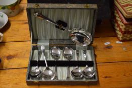 A cased set of silver plated spoons