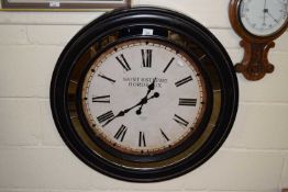 A large reproduction French Bordeaux wall clock