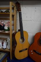 A Hohner acoustic guitar