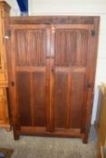 Oak two door wardrobe with linen fold carving