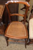 A cane seated bedroom chair