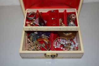 A case of assorted costume jewellery