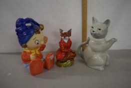 A Royal Stratford model of a fox together with a Noddy biscuit barrel and a cat shaped teapot