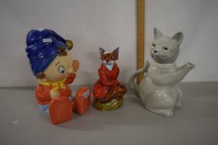 A Royal Stratford model of a fox together with a Noddy biscuit barrel and a cat shaped teapot