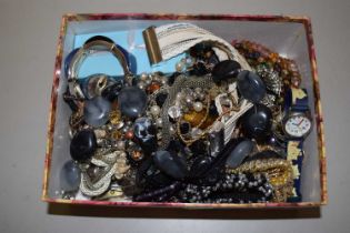 A case of various costume jewellery