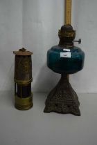 An oil lamp base together with an Ackroyd & Best improved miners lamp (2)