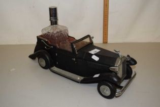 A model Rolls Royce decanter stand with glasses