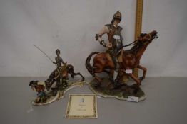 A Capodimonte model of a Knight on horseback together with another smaller (2)
