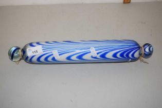 A swirled blue glass rolling pin