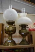 Two brass based oil lamps