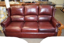 A Thomas Lloyd leather three seater sofa
