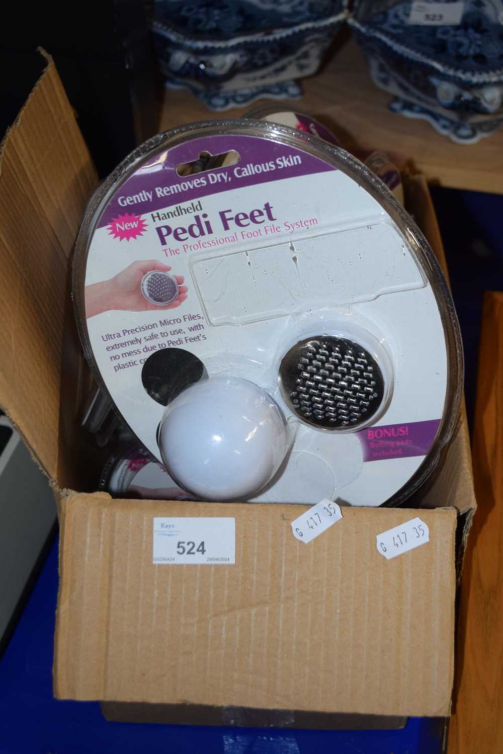 A box of Pedi Feet Foot Files