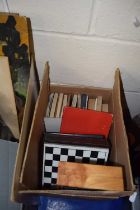 Box of various assorted books, modern plastic chess set etc