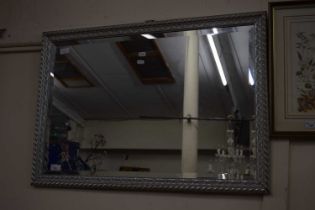 Bevelled wall mirror in a silver finish frame