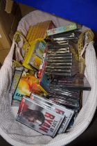 A basket of assorted DVD's