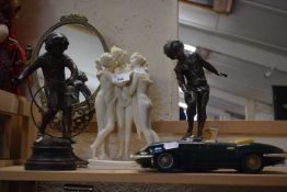Pair of bronze Spelter models of children together with composition model The Three Graces, dressing