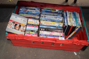 A box of assorted DVD's