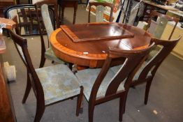 A twin pedestal dining table and six chairs