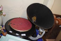 A vintage gramophone with metal horn