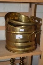A small brass coal bucket