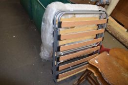 A folding guest bed