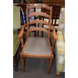 A pine framed ladder back chair