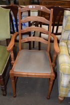 A pine framed ladder back chair