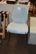 A pair of Kartel Maui chairs