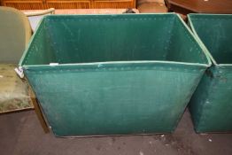 Green plastic and metal framed laundry trolley