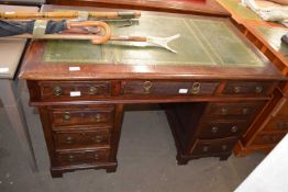 An early 20th Century mahogany twin pedestal office desk with green leather top, 120cm wide
