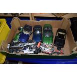 A box of various model cars to include Formula One