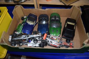 A box of various model cars to include Formula One