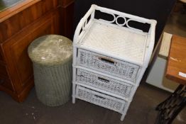 A bamboo framed three drawer chest and a further laundry basket