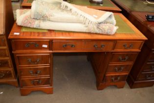 A modern mahogany veneered twin pedestal office desk, 120cm wide