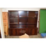 A mahogany veneered lounge display cabinet