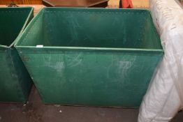 Green plastic and metal framed laundry trolley