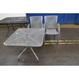 Metal framed garden dining set consisting of table and four chairs