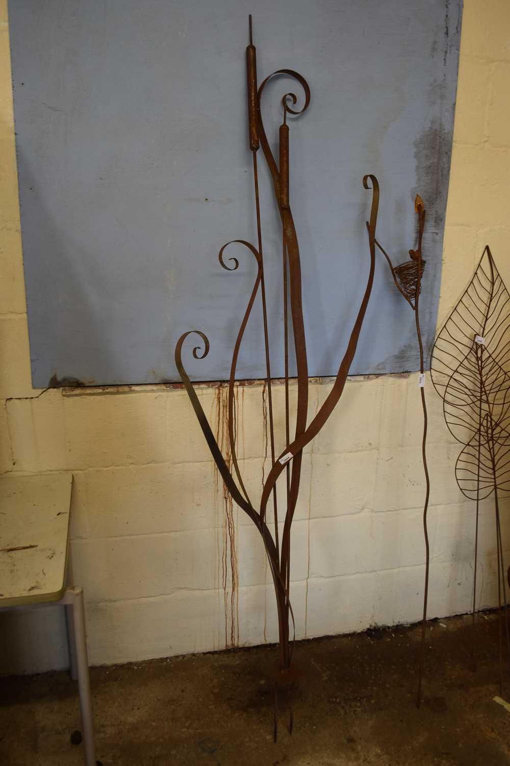 An iron bullrush garden sculpture