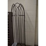 An iron framed three panel screen, height approx 190cm