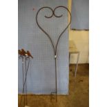 An iron heart shaped garden sculpture