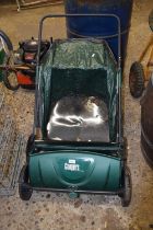 A Coopers push sweeper