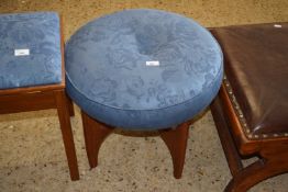 An upholstered round stool, diameter approx 52cm