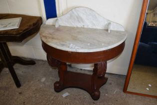 A Victorian Duchess type marble topped wash stand