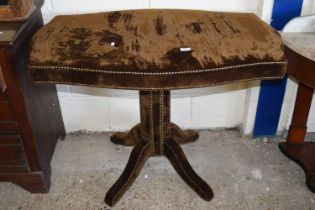 A covered pedestal table